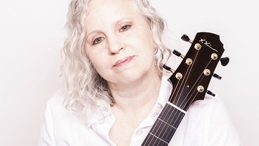 Kathy Wingert with guitar