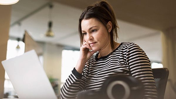 woman studying on computer