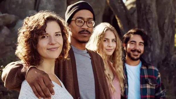 A group of people standing next to each other.