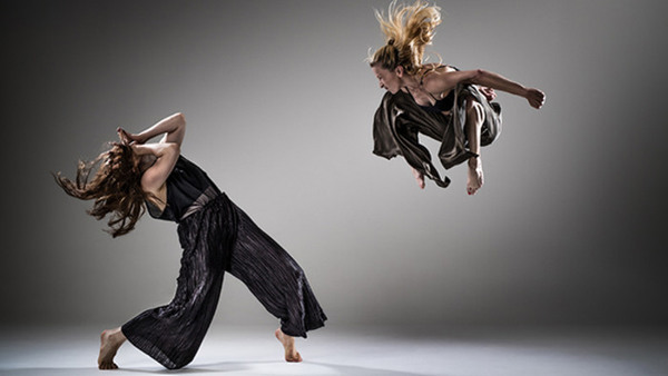 Women dancing.