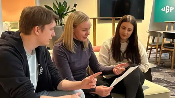 Group of educators and students collaborating in school education projects